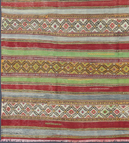 Fine Weave Turkish Kilim with Embroidery - With a combination of stripe and diamond patterns, this beautiful Kilim features intense and vivid colors of green, red, gray, purple, gold, orange, brown, and ivory. Measures: 6'2 x 9'2. - Keivan Woven ArtsTU - NED - 115 - 3540Rug