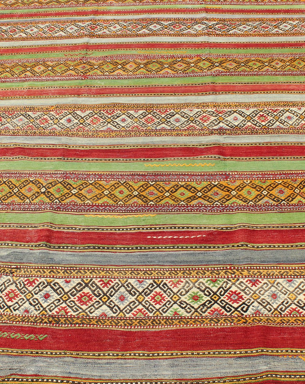 Fine Weave Turkish Kilim with Embroidery - With a combination of stripe and diamond patterns, this beautiful Kilim features intense and vivid colors of green, red, gray, purple, gold, orange, brown, and ivory. Measures: 6'2 x 9'2. - Keivan Woven ArtsTU - NED - 115 - 3540Rug