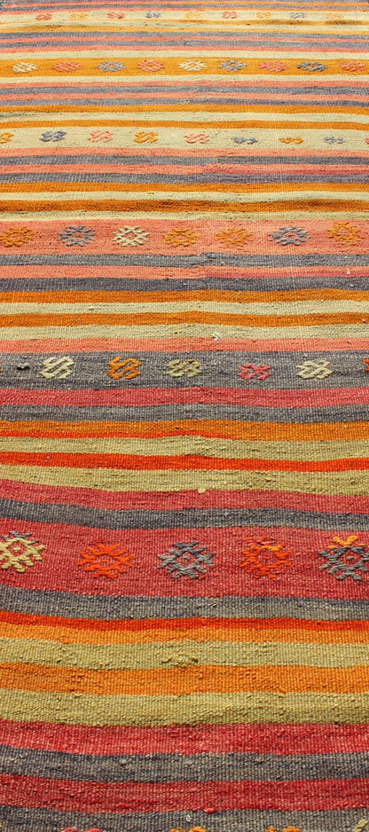 Vintage Turkish Kilim Runner With Geometric Tribal Designs and Colorful Stripes. Keivan Woven Arts / rug TU - NED - 119, country of origin / type: Turkey / Kilim, circa mid - 20th century Measures: 2'10 x 9'2. Featuring tribal shapes rendered in a repe... - Keivan Woven ArtsTU - NED - 119 - 3544Rug