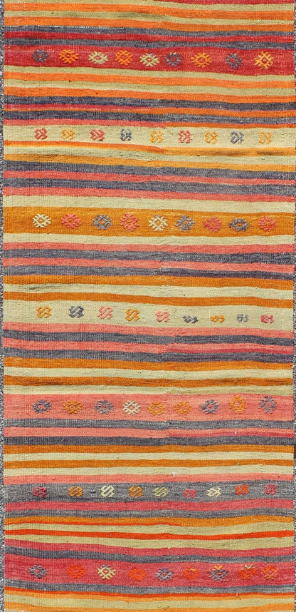 Vintage Turkish Kilim Runner With Geometric Tribal Designs and Colorful Stripes. Keivan Woven Arts / rug TU - NED - 119, country of origin / type: Turkey / Kilim, circa mid - 20th century Measures: 2'10 x 9'2. Featuring tribal shapes rendered in a repe... - Keivan Woven ArtsTU - NED - 119 - 3544Rug