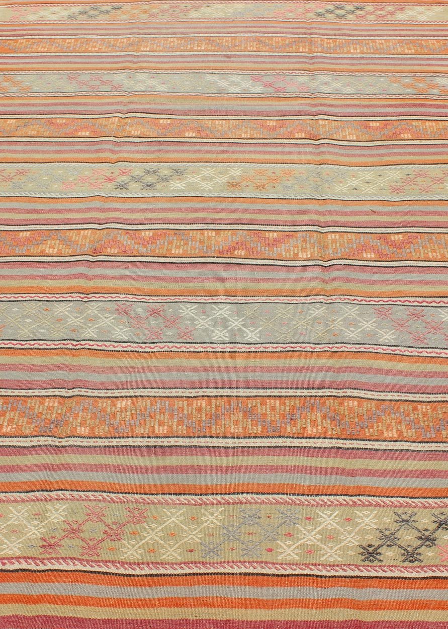 Turkish Kilim Vintage Rug with Assorted Stripe Design in a Variety of Colors, Keivan Woven Arts/ rug TU - NED - 122, country of origin / type: Turkey / Kilim, circa mid - 20th century Measures: 6'3 x 9'7 Featuring a repeating horizontal stripe ... - Keivan Woven ArtsTU - NED - 122 - 3550Rug