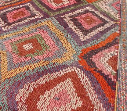 Vintage Turkish Jajim/Kilim Rug with Broken Diamond Pattern and Vibrant Colors: This wonderful Turkish Jajeem from the 1950's features a multi - diamond pattern rendered in a chic color palette. The broken diamond pattern, along with the very beautiful a... - Keivan Woven ArtsTU - NED - 128 - 3554Rug