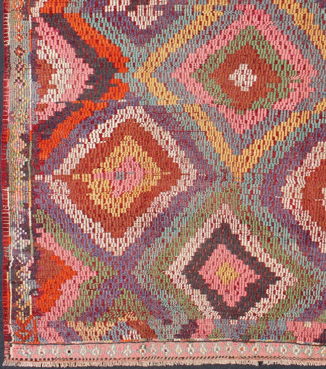Vintage Turkish Jajim/Kilim Rug with Broken Diamond Pattern and Vibrant Colors: This wonderful Turkish Jajeem from the 1950's features a multi - diamond pattern rendered in a chic color palette. The broken diamond pattern, along with the very beautiful a... - Keivan Woven ArtsTU - NED - 128 - 3554Rug