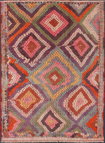 Vintage Turkish Jajim/Kilim Rug with Broken Diamond Pattern and Vibrant Colors: This wonderful Turkish Jajeem from the 1950's features a multi - diamond pattern rendered in a chic color palette. The broken diamond pattern, along with the very beautiful a... - Keivan Woven ArtsTU - NED - 128 - 3554Rug