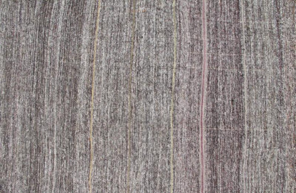Vintage Turkish Kilim Rug with Variegated Stripes in Charcoal, Gray and Orange, rug ned - 136025, country of origin / type: Turkey / Kilim, circa mid - 20th century Measures: 6'3 x 9'2. This vintage tribal Turkish Kilim carpet is set on a na... - Keivan Woven ArtsTU - NED - 136025 - 4596Rug