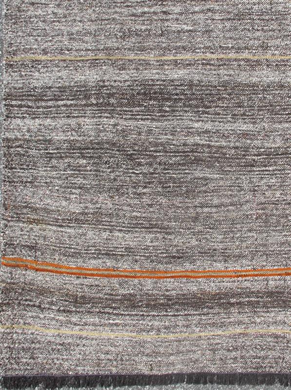 Vintage Turkish Kilim Rug with Variegated Stripes in Charcoal, Gray and Orange, rug ned - 136025, country of origin / type: Turkey / Kilim, circa mid - 20th century Measures: 6'3 x 9'2. This vintage tribal Turkish Kilim carpet is set on a na... - Keivan Woven ArtsTU - NED - 136025 - 4596Rug