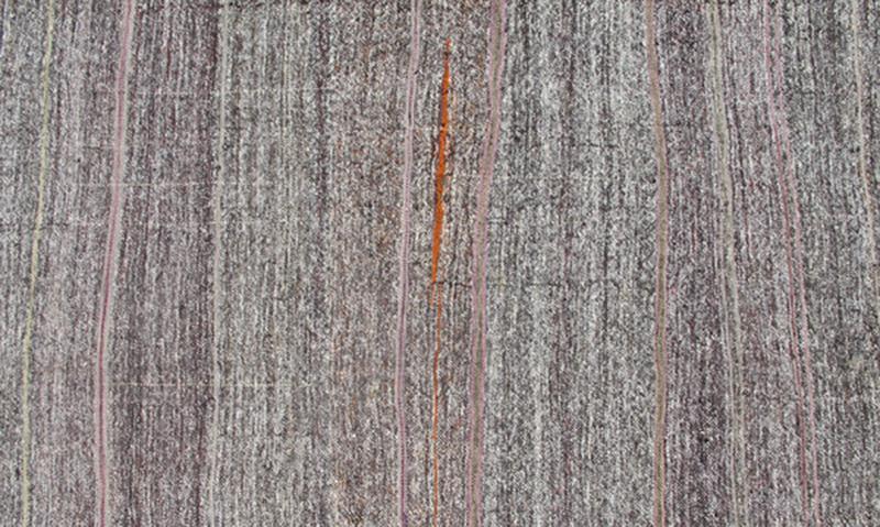 Vintage Turkish Kilim Rug with Variegated Stripes in Charcoal, Gray and Orange, rug ned - 136025, country of origin / type: Turkey / Kilim, circa mid - 20th century Measures: 6'3 x 9'2. This vintage tribal Turkish Kilim carpet is set on a na... - Keivan Woven ArtsTU - NED - 136025 - 4596Rug