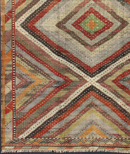 Beautiful Embroidered Turkish Jajeem - This geometric embroidered flat - weave Jajeem from Turkey bears a repeating large diamond design set on a multicolored background. The repeating design features vibrant colors of gold, light green, red, yellow, orang... - Keivan Woven ArtsTU - NED - 136031 - 4614Rug
