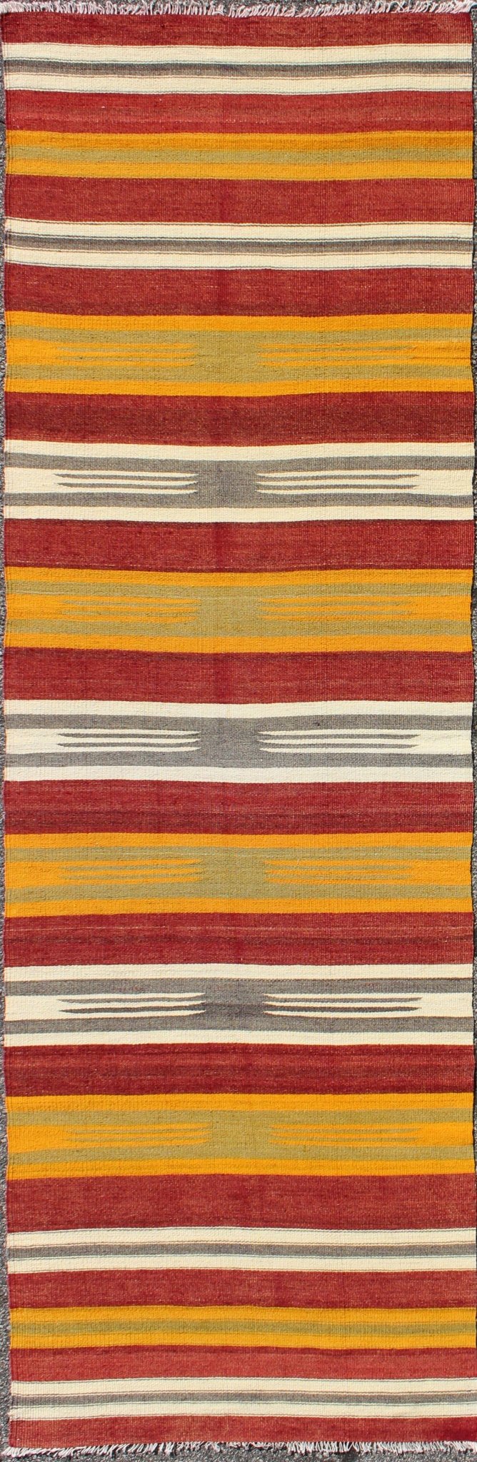 Vintage Turkish Kilim Runner with Stripes in Red, Green, Yellow, Ivory, Gray, rug ned - 145, country of origin / type: Turkey / Kilim, circa mid - 20th century. Woven during the mid - 20th century in Turkey, this designer Kilim is decorated with a hor... - Keivan Woven ArtsTU - NED - 145 - 3572Rug