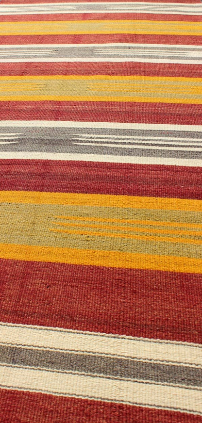 Vintage Turkish Kilim Runner with Stripes in Red, Green, Yellow, Ivory, Gray, rug ned - 145, country of origin / type: Turkey / Kilim, circa mid - 20th century. Woven during the mid - 20th century in Turkey, this designer Kilim is decorated with a hor... - Keivan Woven ArtsTU - NED - 145 - 3572Rug