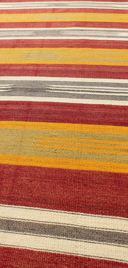 Vintage Turkish Kilim Runner with Stripes in Red, Green, Yellow, Ivory, Gray, rug ned - 145, country of origin / type: Turkey / Kilim, circa mid - 20th century. Woven during the mid - 20th century in Turkey, this designer Kilim is decorated with a hor... - Keivan Woven ArtsTU - NED - 145 - 3572Rug