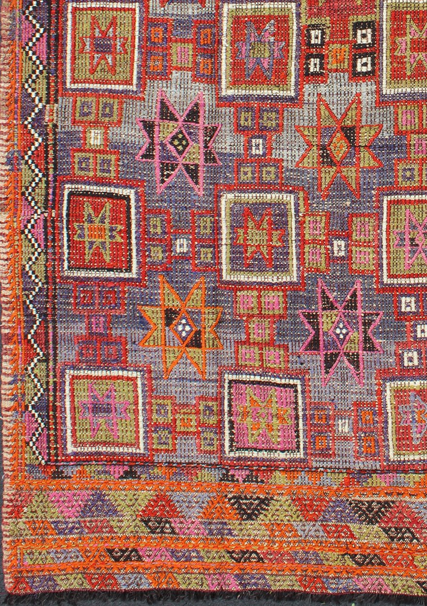 Vintage Embroidered Flat Weave Kilim Rug with Geometrics and Squared Design. Measures: 5'8 x 8'7. Rendered in star shapes with a spotted and speckled assortment of geometric elements, this unique Mid - Century Jajeem/Jijim/Kilim showcases an array ... - Keivan Woven ArtsTU - NED - 201 - 6398Rug