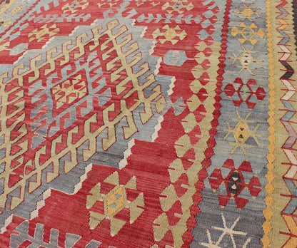 Vintage Turkish Kilim flat - weave rug with geometric design in red, yellow, green, rug tu - ned - 22, country of origin / type: Turkey / Oushak, circa 1950 Geometric elements take center stage in this uniquely designed vintage Kilim. Like this partic... - Keivan Woven ArtsTU - NED - 22 - 3074Rug