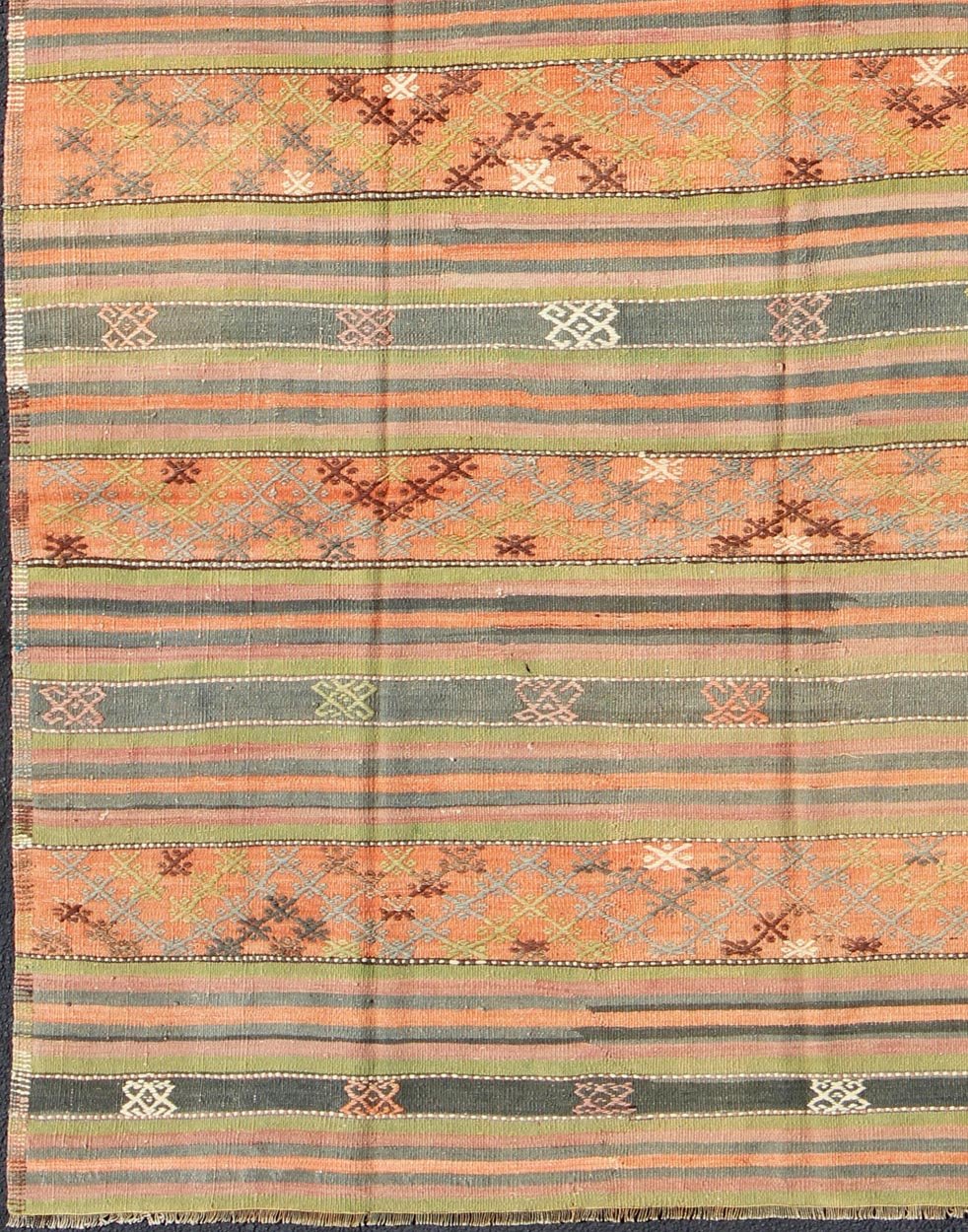 Vintage Turkish Kilim rug with geometric shapes and colorful stripes, rug ned - 28, country of origin / type: turkey / Kilim, circa mid - 20th century Featuring geometric shapes rendered in a repeating horizontal stripe design, this unique Mid - Centu... - Keivan Woven ArtsTU - NED - 28 - 3078Rug
