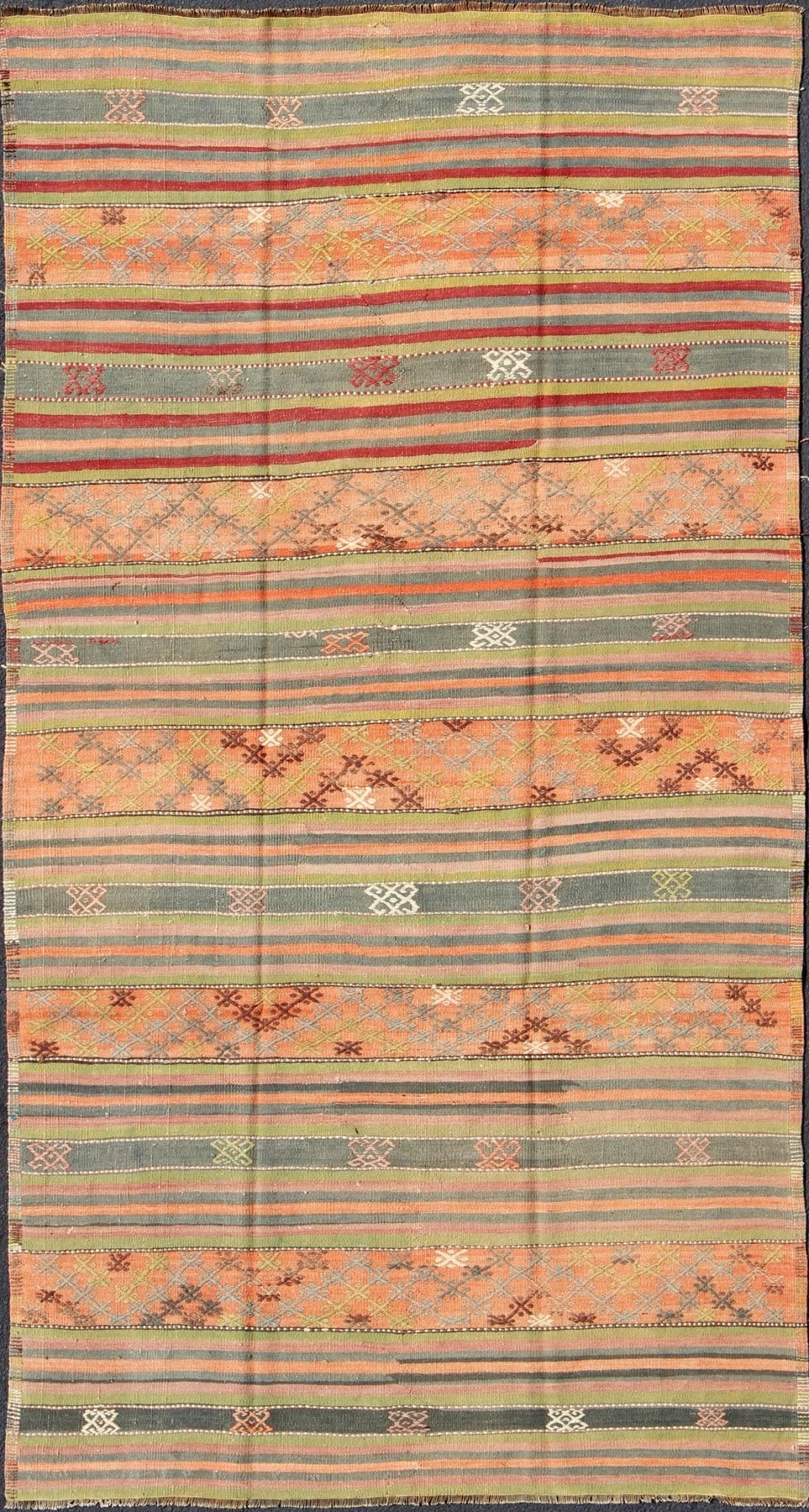 Vintage Turkish Kilim rug with geometric shapes and colorful stripes, rug ned - 28, country of origin / type: turkey / Kilim, circa mid - 20th century Featuring geometric shapes rendered in a repeating horizontal stripe design, this unique Mid - Centu... - Keivan Woven ArtsTU - NED - 28 - 3078Rug