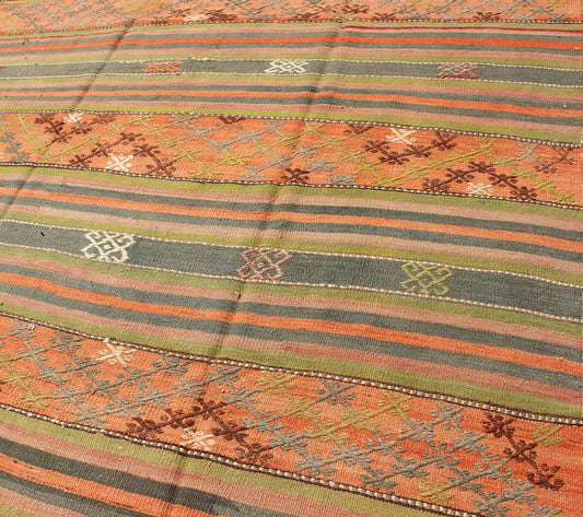 Vintage Turkish Kilim rug with geometric shapes and colorful stripes, rug ned - 28, country of origin / type: turkey / Kilim, circa mid - 20th century Featuring geometric shapes rendered in a repeating horizontal stripe design, this unique Mid - Centu... - Keivan Woven ArtsTU - NED - 28 - 3078Rug
