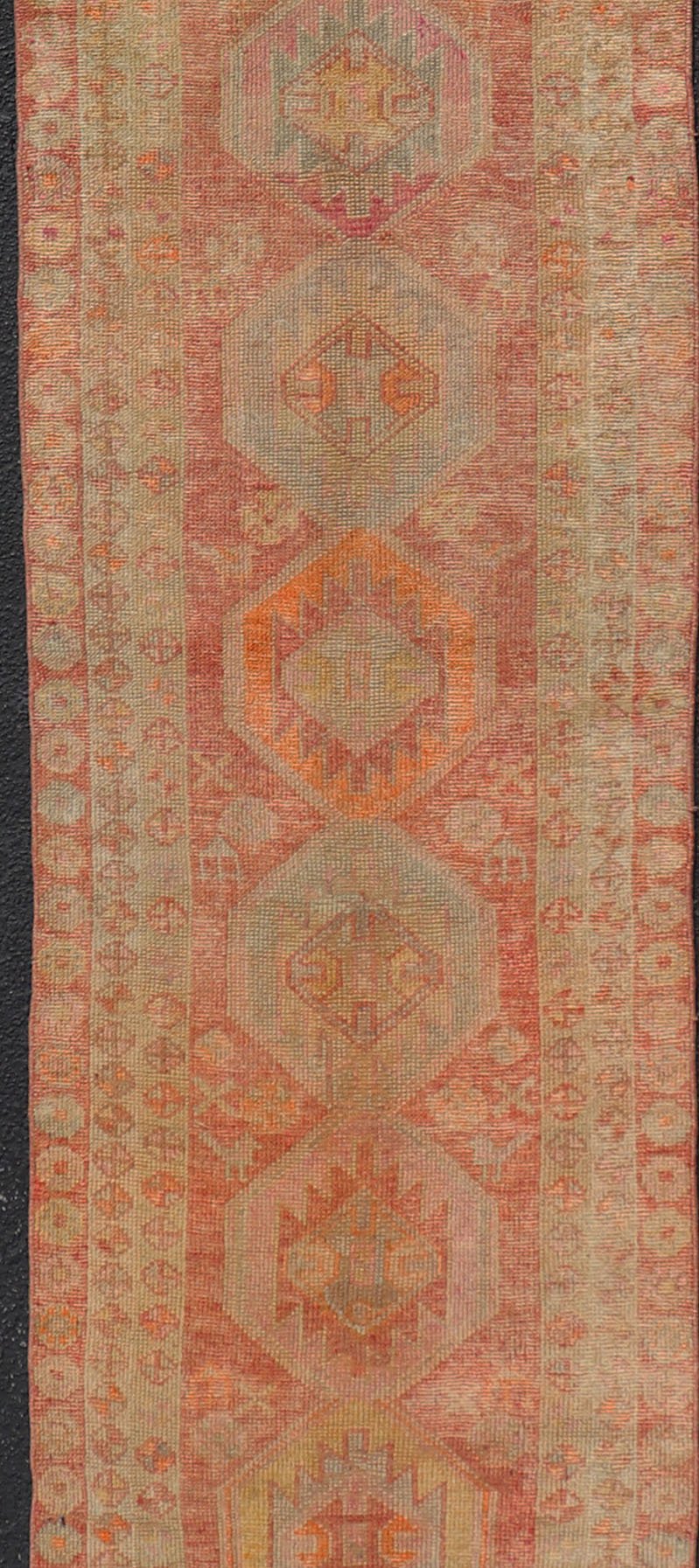 Vintage Long Turkish Oushak Runner with Tribal Medallions in Soft Red. Keivan Woven Arts / rug TU - NED - 4650, country of origin / type: Turkey / Oushak, circa 1950 Measures: 2'6 x 14'0 This vintage Turkish Oushak rug features a multi - medal... - Keivan Woven ArtsTU - NED - 4650 - 23054Rug