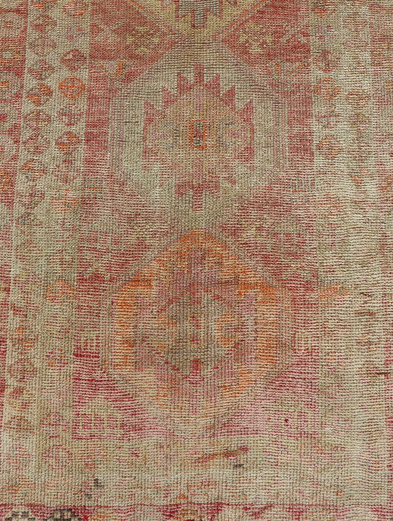 Vintage Long Turkish Oushak Runner with Tribal Medallions in Soft Red. Keivan Woven Arts / rug TU - NED - 4650, country of origin / type: Turkey / Oushak, circa 1950 Measures: 2'6 x 14'0 This vintage Turkish Oushak rug features a multi - medal... - Keivan Woven ArtsTU - NED - 4650 - 23054Rug