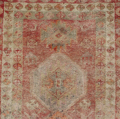 Vintage Long Turkish Oushak Runner with Tribal Medallions in Soft Red. Keivan Woven Arts / rug TU - NED - 4650, country of origin / type: Turkey / Oushak, circa 1950 Measures: 2'6 x 14'0 This vintage Turkish Oushak rug features a multi - medal... - Keivan Woven ArtsTU - NED - 4650 - 23054Rug