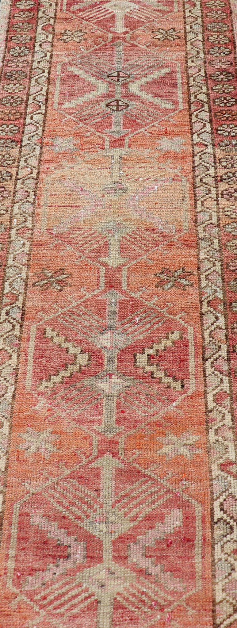 Measures: 2'10 x 14'7 Vintage Turkish Runner with Tribal Medallion Design in Variegated Red. Keivan Woven Arts / rug TU - NED - 4679, country of origin / type: Turkey / Oushak, circa 1940 This expansive runner from Turkey features a colorful pat... - Keivan Woven ArtsTU - NED - 4679 - 23060Rug