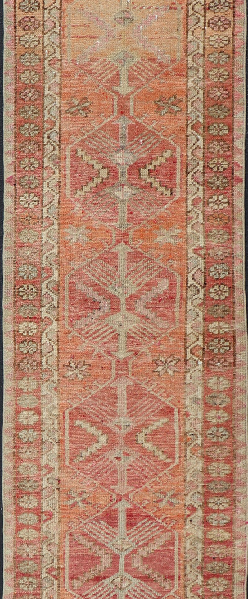 Measures: 2'10 x 14'7 Vintage Turkish Runner with Tribal Medallion Design in Variegated Red. Keivan Woven Arts / rug TU - NED - 4679, country of origin / type: Turkey / Oushak, circa 1940 This expansive runner from Turkey features a colorful pat... - Keivan Woven ArtsTU - NED - 4679 - 23060Rug