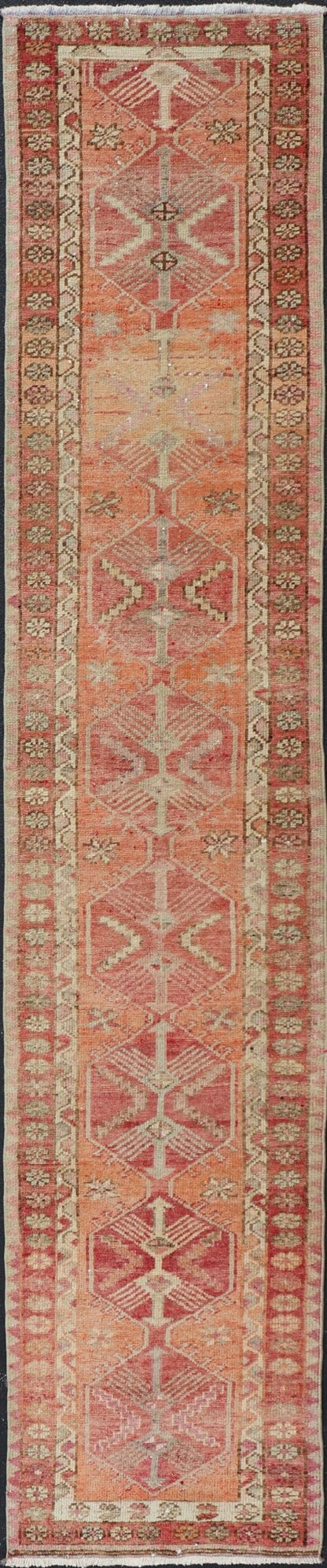 Measures: 2'10 x 14'7 Vintage Turkish Runner with Tribal Medallion Design in Variegated Red. Keivan Woven Arts / rug TU - NED - 4679, country of origin / type: Turkey / Oushak, circa 1940 This expansive runner from Turkey features a colorful pat... - Keivan Woven ArtsTU - NED - 4679 - 23060Rug