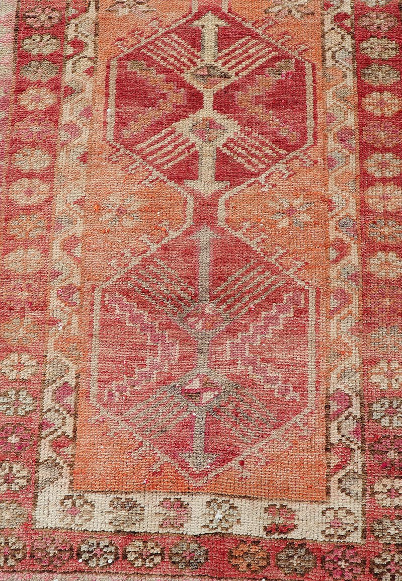 Measures: 2'10 x 14'7 Vintage Turkish Runner with Tribal Medallion Design in Variegated Red. Keivan Woven Arts / rug TU - NED - 4679, country of origin / type: Turkey / Oushak, circa 1940 This expansive runner from Turkey features a colorful pat... - Keivan Woven ArtsTU - NED - 4679 - 23060Rug