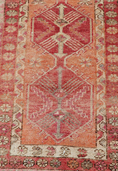 Measures: 2'10 x 14'7 Vintage Turkish Runner with Tribal Medallion Design in Variegated Red. Keivan Woven Arts / rug TU - NED - 4679, country of origin / type: Turkey / Oushak, circa 1940 This expansive runner from Turkey features a colorful pat... - Keivan Woven ArtsTU - NED - 4679 - 23060Rug