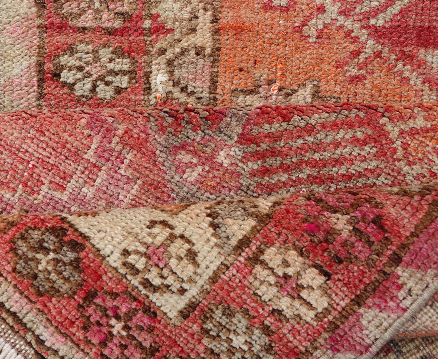 Measures: 2'10 x 14'7 Vintage Turkish Runner with Tribal Medallion Design in Variegated Red. Keivan Woven Arts / rug TU - NED - 4679, country of origin / type: Turkey / Oushak, circa 1940 This expansive runner from Turkey features a colorful pat... - Keivan Woven ArtsTU - NED - 4679 - 23060Rug