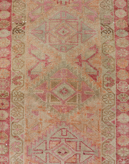 Measures: 2'8 x 14'0 Vintage Oushak Runner with Geometric Medallions in Soft Coral and Orange. Keivan Woven Arts / rug TU - NED - 4680, country of origin / type: Turkey / Oushak, circa 1960 This Oushak runner from Turkey features a creative design c... - Keivan Woven ArtsTU - NED - 4680 - 23066Rug