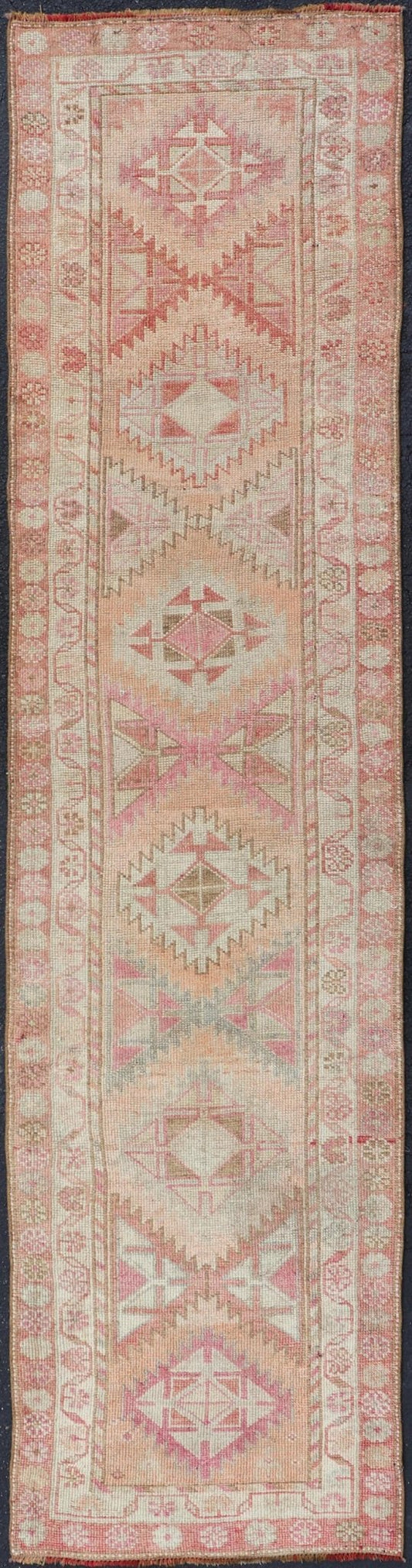 Measures: 2'11 x 12'0 Vintage Turkish Oushak Runner with Latch Hook Medallions in Soft Colors. Keivan Woven Arts / rug TU - NED - 4681, country of origin / type: Turkey / Oushak, circa 1950 This Oushak carpet runner from mid - 20th century Turkey ... - Keivan Woven ArtsTU - NED - 4681 - 22081Rug