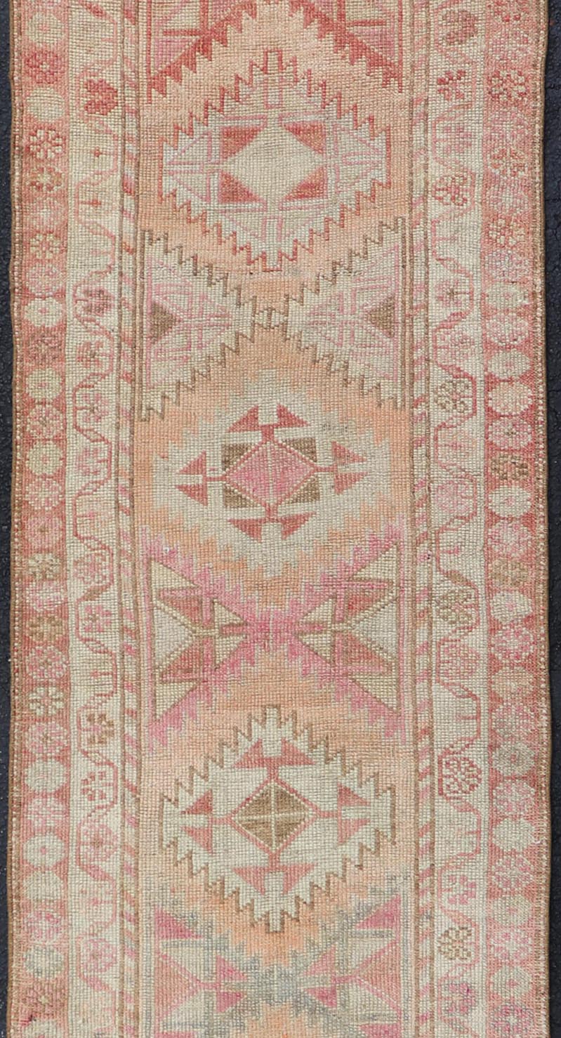 Measures: 2'11 x 12'0 Vintage Turkish Oushak Runner with Latch Hook Medallions in Soft Colors. Keivan Woven Arts / rug TU - NED - 4681, country of origin / type: Turkey / Oushak, circa 1950 This Oushak carpet runner from mid - 20th century Turkey ... - Keivan Woven ArtsTU - NED - 4681 - 22081Rug