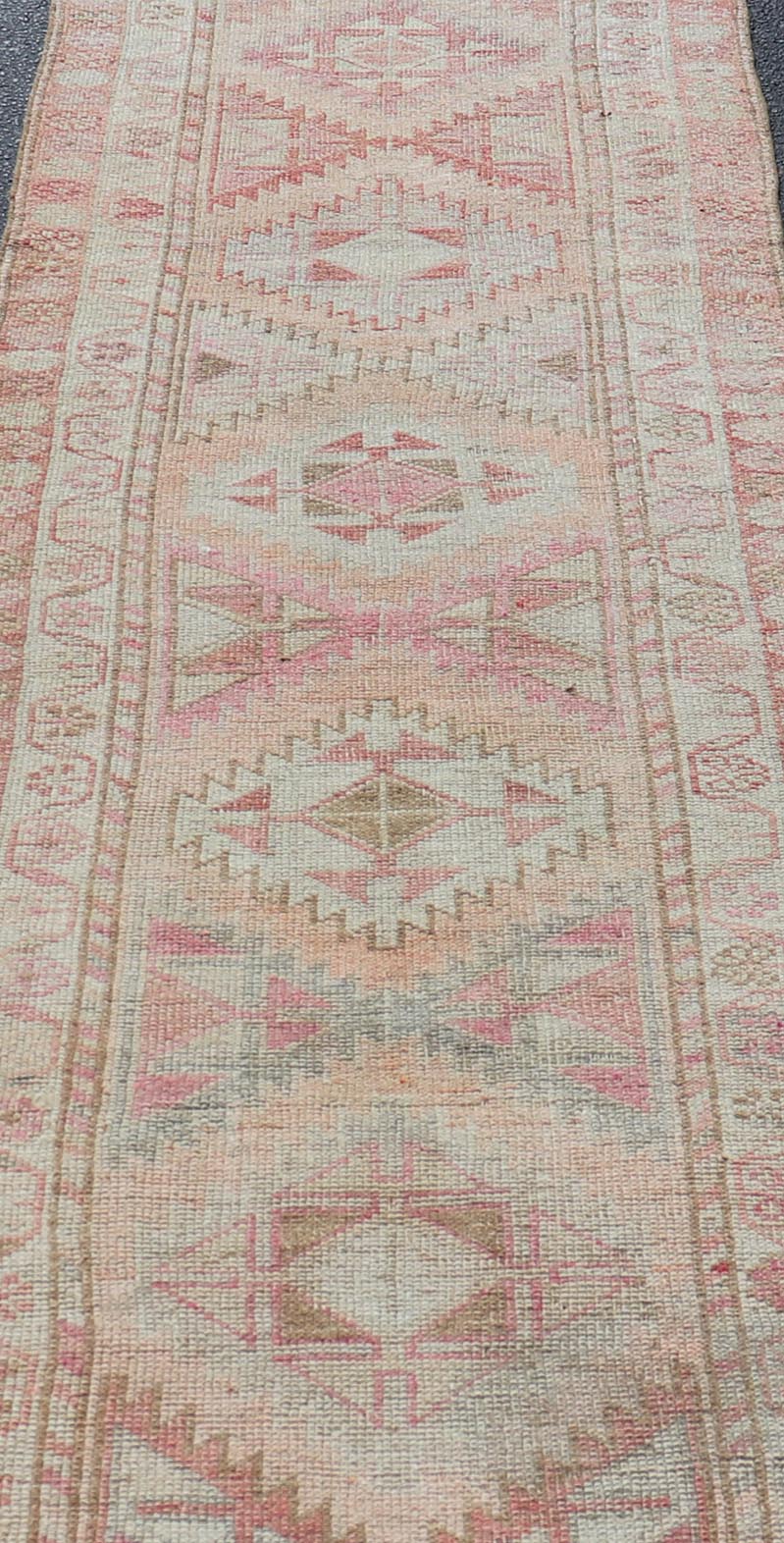 Measures: 2'11 x 12'0 Vintage Turkish Oushak Runner with Latch Hook Medallions in Soft Colors. Keivan Woven Arts / rug TU - NED - 4681, country of origin / type: Turkey / Oushak, circa 1950 This Oushak carpet runner from mid - 20th century Turkey ... - Keivan Woven ArtsTU - NED - 4681 - 22081Rug