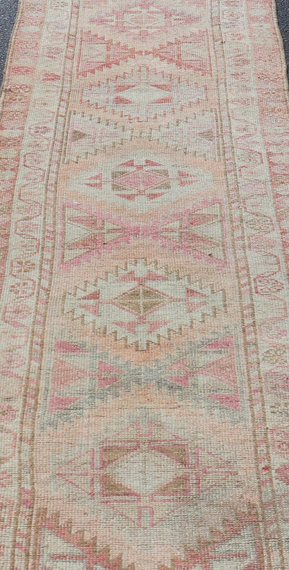 Measures: 2'11 x 12'0 Vintage Turkish Oushak Runner with Latch Hook Medallions in Soft Colors. Keivan Woven Arts / rug TU - NED - 4681, country of origin / type: Turkey / Oushak, circa 1950 This Oushak carpet runner from mid - 20th century Turkey ... - Keivan Woven ArtsTU - NED - 4681 - 22081Rug