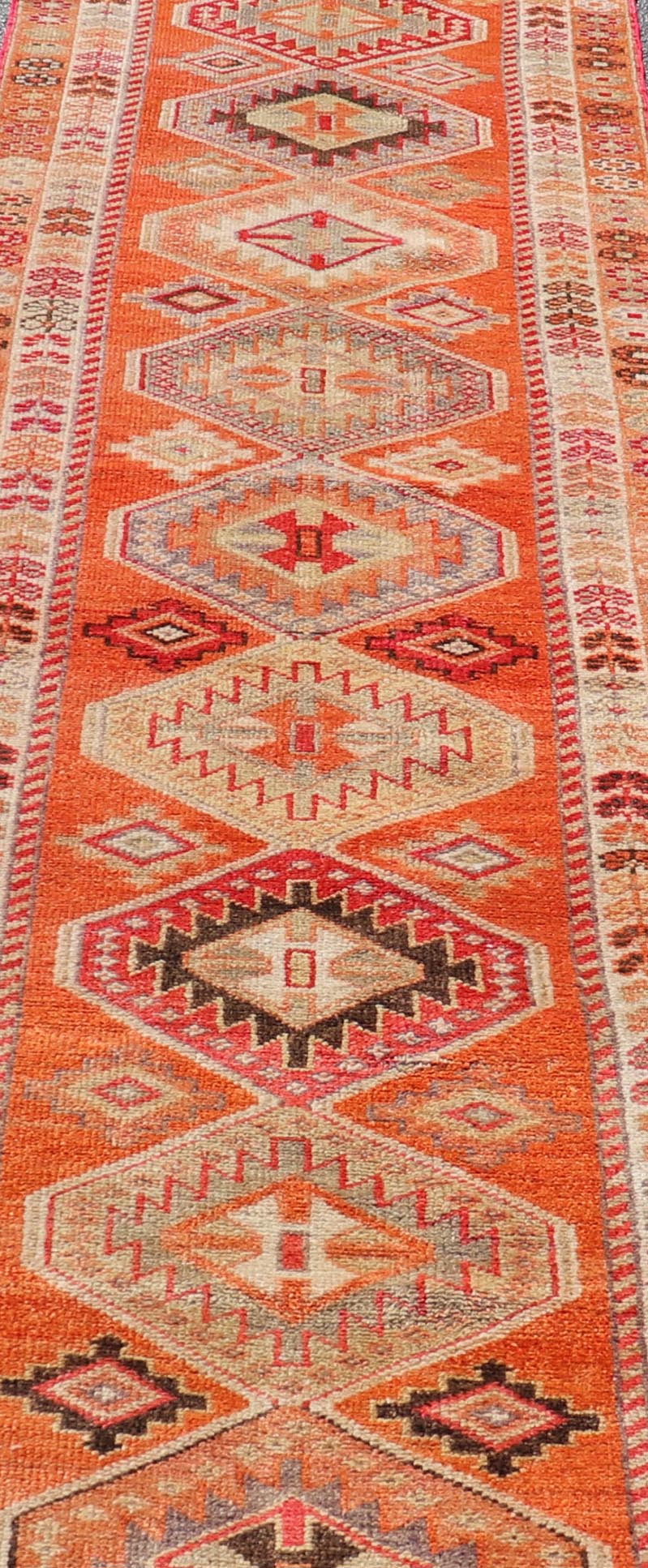 Measures: 2'9 x 12'3 Turkish Vintage Oushak Runner with Tribal Medallion Design in Orange and Ivory. Keivan Woven Arts / rug TU - NED - 4685, country of origin / type: Turkey / Oushak, circa 1950 This beautiful vintage Turkish runner features a ... - Keivan Woven ArtsTU - NED - 4685 - 22093Rug