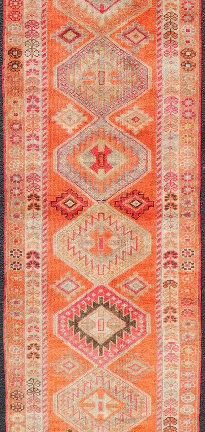 Measures: 2'9 x 12'3 Turkish Vintage Oushak Runner with Tribal Medallion Design in Orange and Ivory. Keivan Woven Arts / rug TU - NED - 4685, country of origin / type: Turkey / Oushak, circa 1950 This beautiful vintage Turkish runner features a ... - Keivan Woven ArtsTU - NED - 4685 - 22093Rug