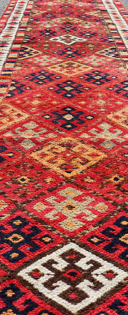 Measures: 2'10 x 14'0 Vintage Turkish Oushak Runner with Medallions in Red and Multi Colors. Keivan Woven Arts / rug TU - NED - 4686, country of origin / type: Turkey / Oushak, circa mid - 20th Century. This Oushak runner from mid - 20th century Turkey ... - Keivan Woven ArtsTU - NED - 4686 - 22099Rug