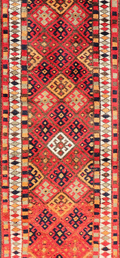 Measures: 2'10 x 14'0 Vintage Turkish Oushak Runner with Medallions in Red and Multi Colors. Keivan Woven Arts / rug TU - NED - 4686, country of origin / type: Turkey / Oushak, circa mid - 20th Century. This Oushak runner from mid - 20th century Turkey ... - Keivan Woven ArtsTU - NED - 4686 - 22099Rug