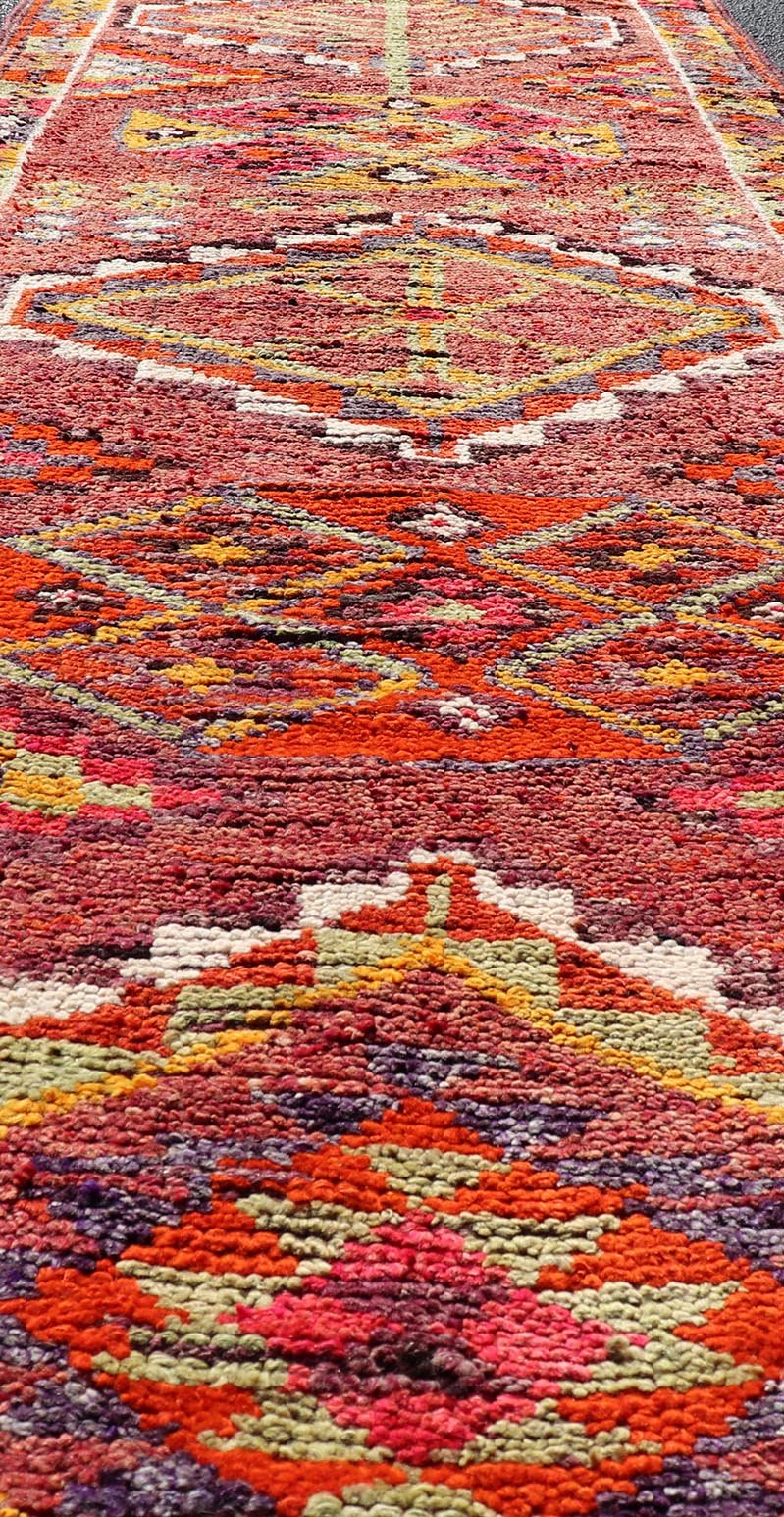 Measures: 3'0 x 12'10 Vintage Turkish Oushak Runner with Medallions in Purple and Multi Colors. Keivan Woven Arts / rug TU - NED - 4687, country of origin / type: Turkey / Oushak, circa mid - 20th Century. This Oushak runner from mid - 20th century Turk... - Keivan Woven ArtsTU - NED - 4687 - 22105Rug