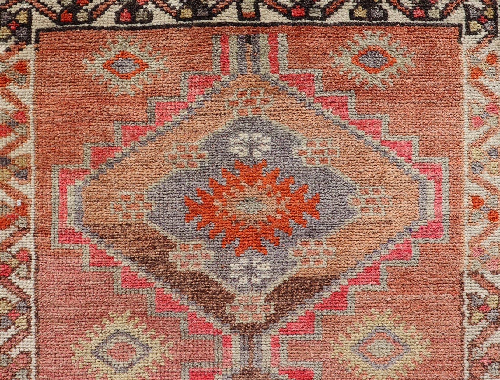 Measures: 2'10 x 11'10 Vintage Turkish Oushak Runner with Tribal Medallions in Redish Tones. Keivan Woven Arts / rug TU - NED - 4688, country of origin / type: Turkey / Oushak, circa 1950. This vintage Oushak runner features a unique blend of cheerfu... - Keivan Woven ArtsTU - NED - 4688 - 22111Rug