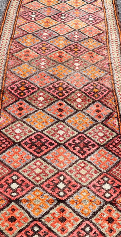 Measures: 3'2 x 14'1 Turkish Vintage Runner with All - Over Diamond Kurdish Design in Multi - Colors. Keivan Woven Arts / rug TU - NED - 4689, country of origin / type: Turkey / Oushak, circa 1950. This beautiful vintage Oushak runner from 1950s Turkey ... - Keivan Woven ArtsTU - NED - 4689 - 22117Rug