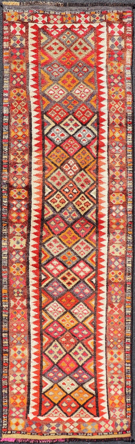 Measures: 2'9 x 9'10 Multicolored Midcentury Turkish Kurdish Oushak Runner with Diamonds and Stars. Keivan Woven Arts / rug TU - NED - 4692, country of origin / type: Iran / Kurdish Oushak, circa 1950 This Kurdish tribal rug was woven by Kurdish wea... - Keivan Woven ArtsTU - NED - 4692 - 22129
