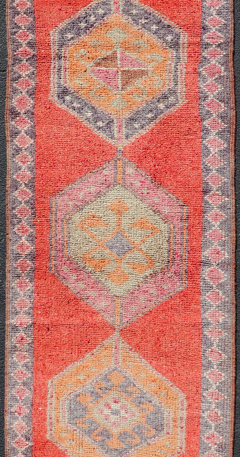 Colorful Oushak Vintage Turkish Runner with Geometric Medallion Design With Orangey - Red Measures: 3'0 x 11'9 Oushak Vintage Turkish Runner with Geometric Medallion Design With Orangey - Red. Keivan Woven Arts / rug TU - NED - 4694, country of or... - Keivan Woven ArtsTU - NED - 4694 - 22141Rug