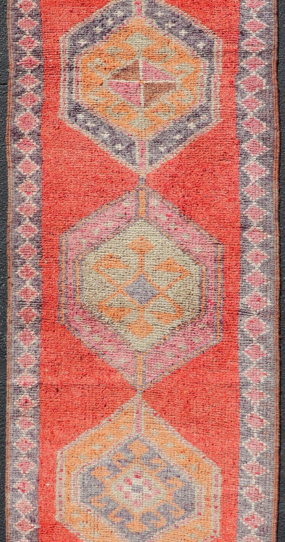 Colorful Oushak Vintage Turkish Runner with Geometric Medallion Design With Orangey - Red Measures: 3'0 x 11'9 Oushak Vintage Turkish Runner with Geometric Medallion Design With Orangey - Red. Keivan Woven Arts / rug TU - NED - 4694, country of or... - Keivan Woven ArtsTU - NED - 4694 - 22141Rug