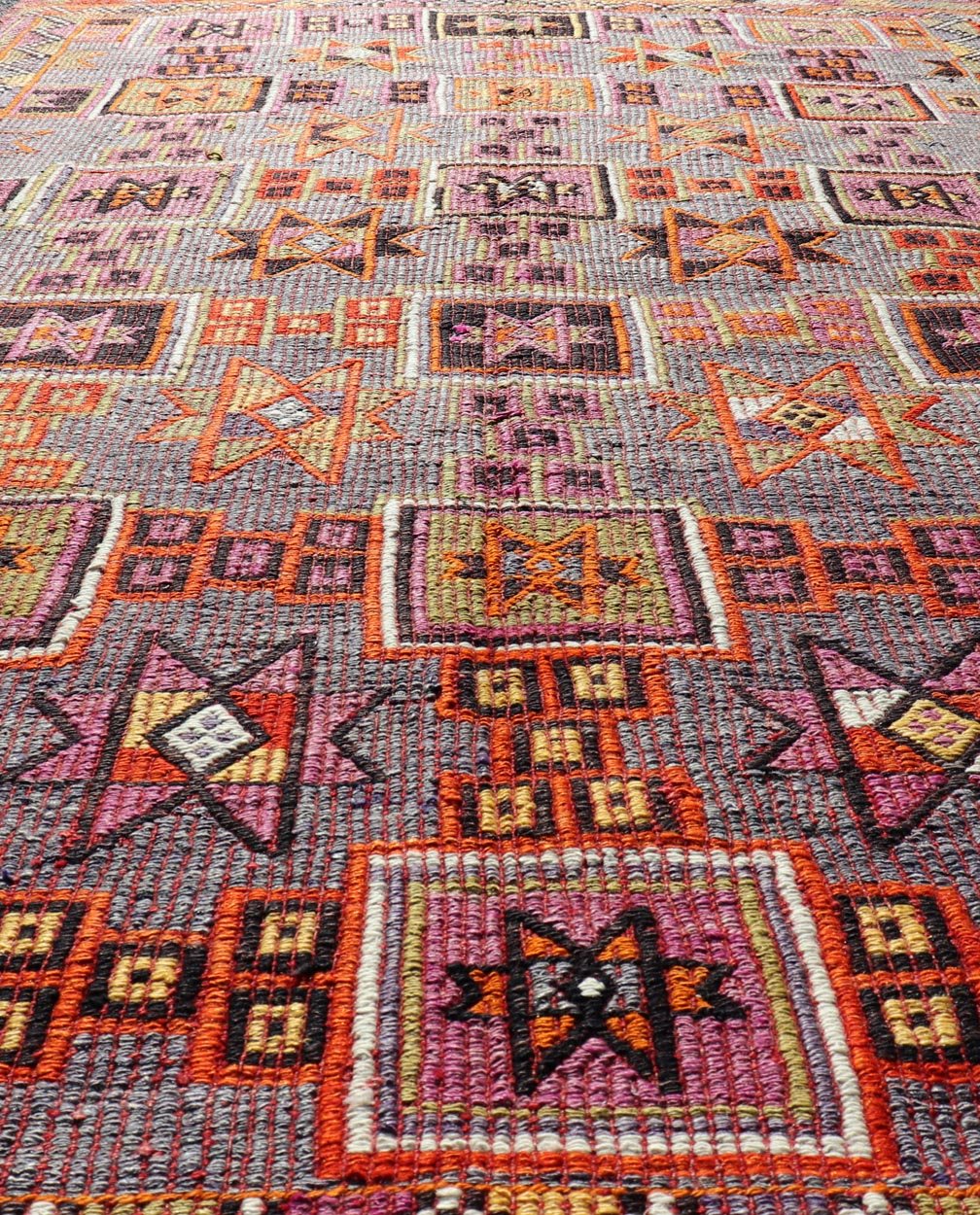 Measures: 5'7 x 9'10 Colorful Vintage Kilim Embroidered Jajeem with Square and Star Design In Purple. Keivan Woven Arts / rug TU - NED - 4697, country of origin / type: Turkey / Kilim, circa 1950 Featuring tribal shapes of stars and boxes with a ... - Keivan Woven ArtsTU - NED - 4697 - 22153Rug