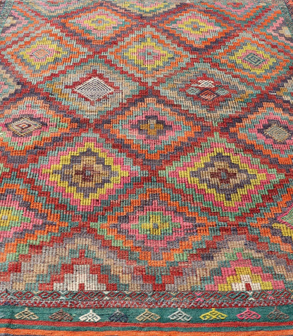 Measures: 6'5 x 8'9 Colorful Vintage Turkish Flat - Weave Tribal Modern Kilim with Embroideries. Keivan Woven Arts / rug TU - NED - 4698, country of origin / type: Turkey / Kilim, circa mid - 20th Century. Rendered in diamond shapes with a spotted a... - Keivan Woven ArtsTU - NED - 4698 - 22159Rug