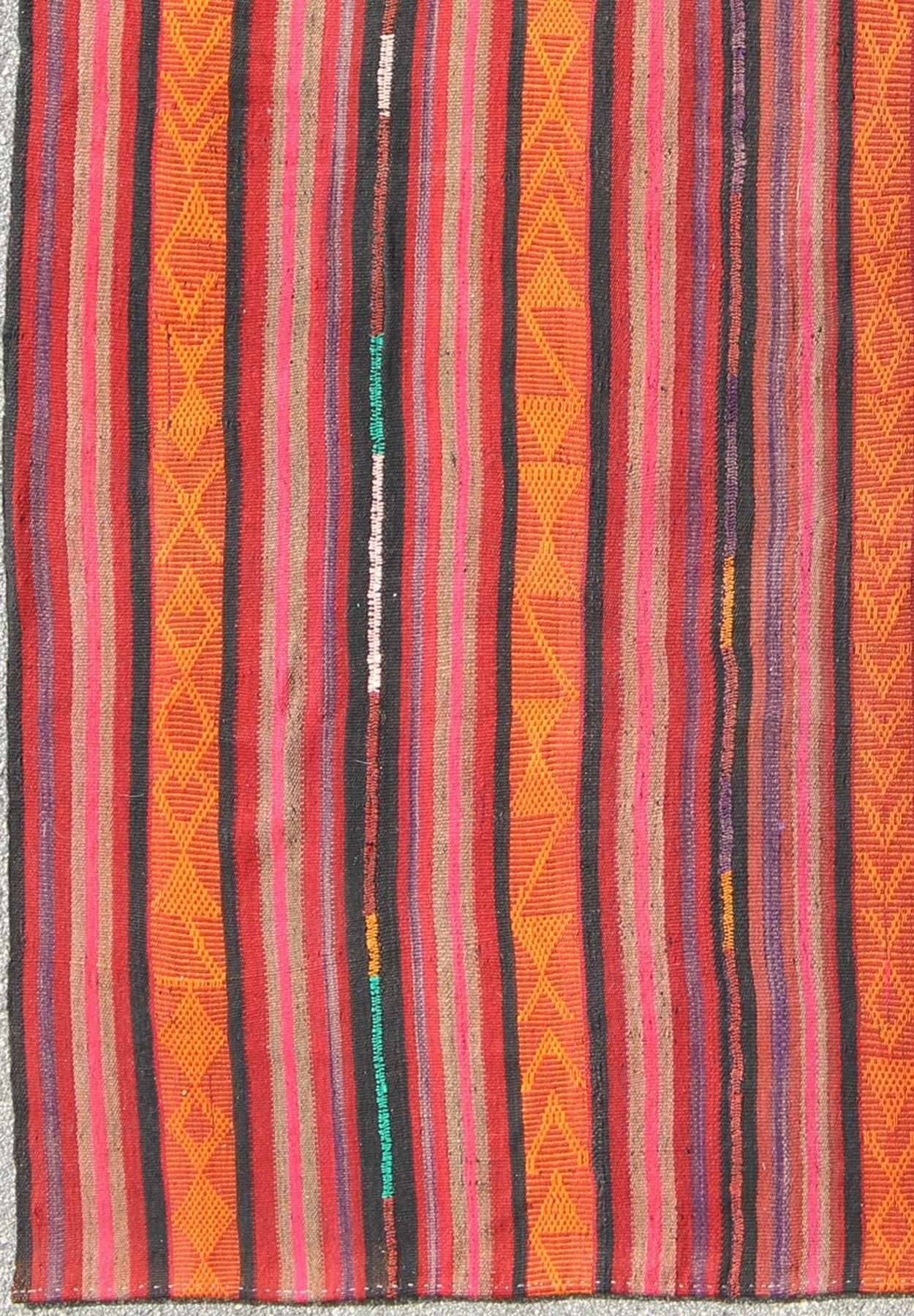 Vintage Flat - Weave Turkish Kilim in Charcoal, Orange, Purple, Red and Pink. Kilim vintage rug from Turkey with striped pattern, rug Tu - Ned - 4733, country of origin / type: Turkey / Kilim, circa 1940 This tribal Kilim from Turkey bears vertica... - Keivan Woven ArtsTU - NED - 4733 - 9222Rug