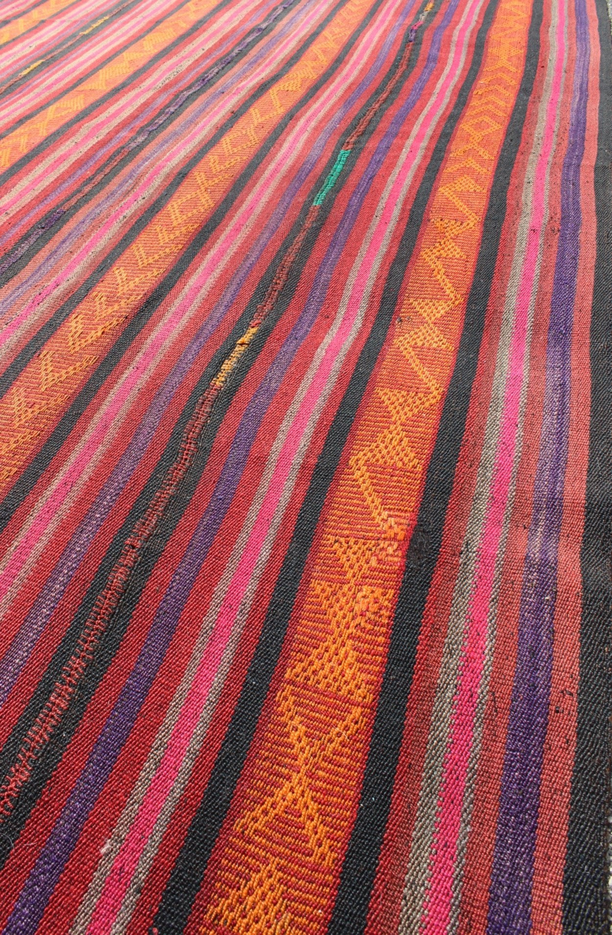 Vintage Flat - Weave Turkish Kilim in Charcoal, Orange, Purple, Red and Pink. Kilim vintage rug from Turkey with striped pattern, rug Tu - Ned - 4733, country of origin / type: Turkey / Kilim, circa 1940 This tribal Kilim from Turkey bears vertica... - Keivan Woven ArtsTU - NED - 4733 - 9222Rug
