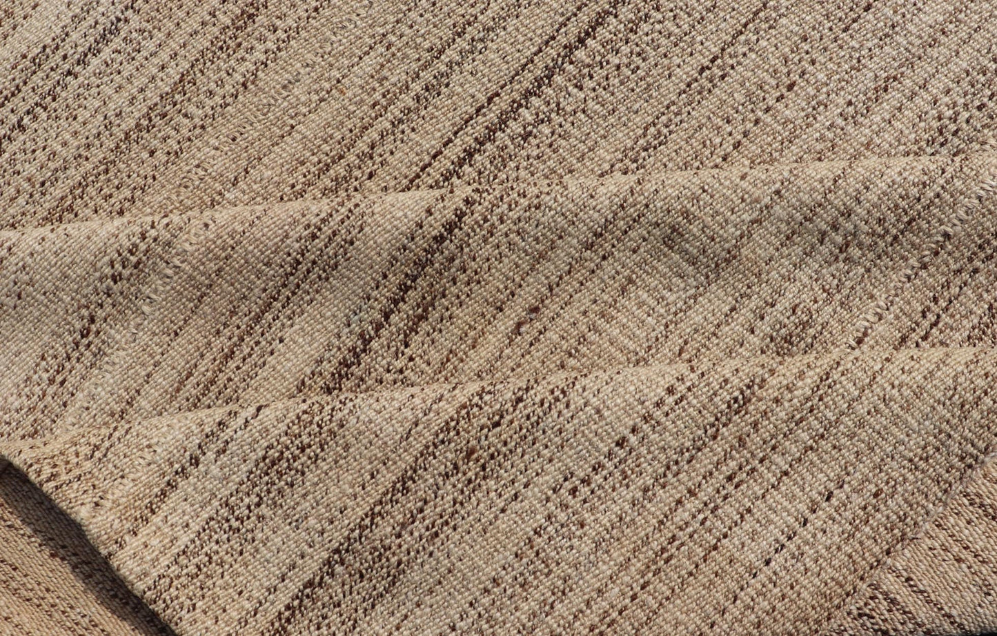 Vintage Hand - Woven Turkish Kilim in Wool with Striped Design in Earthy Tones This flat - weave tribal Turkish kilim has been hand - woven in wool. The rug features an all - over striped design, and is rendered in earthy tones; making this rug a superb... - Keivan Woven ArtsTU - NED - 4973 - 19862