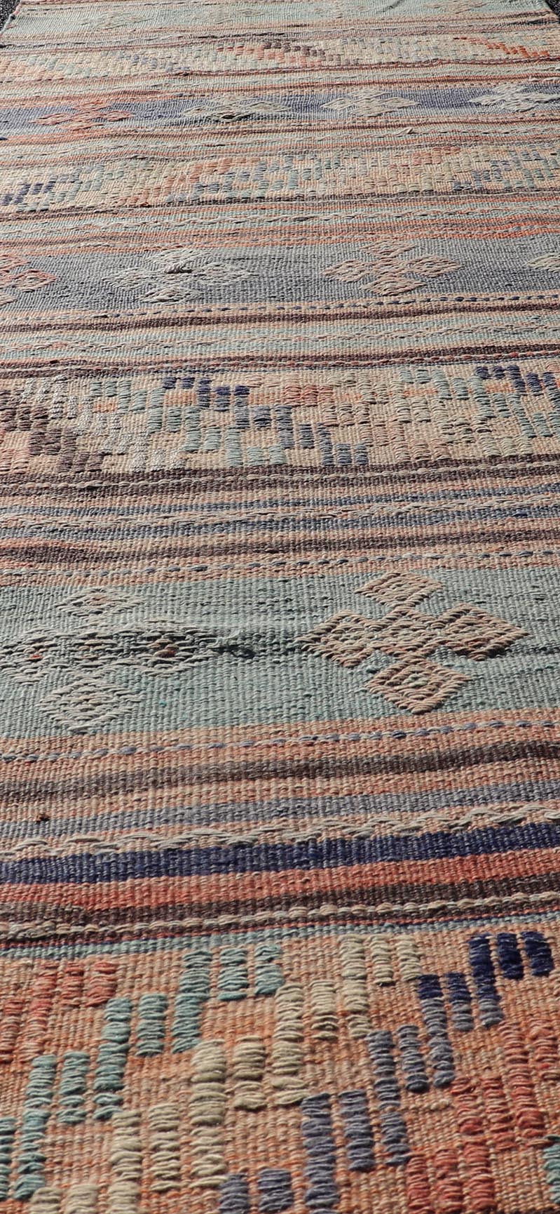 Measures: 2'10 x 11'9 Colorful Vintage Embroidered Kilim Runner with Stripe's and Geometric Motifs. Keivan Woven Arts / rug TU - NED - 5001, country of origin / type: Turkey / Kilim, circa 1950 This vintage Kilim displays an array of designs, includ... - Keivan Woven ArtsTU - NED - 5001 - 22171Rug